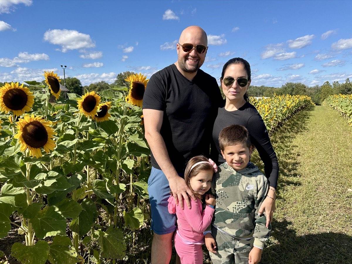 Eugene Bondar with his wife and two children